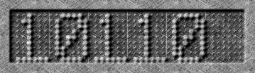 Digits 1 0 1 1 0 in a grey metal-looking recessed rectangle, the digits are formed of raised circular segments reminiscent of a pin board.